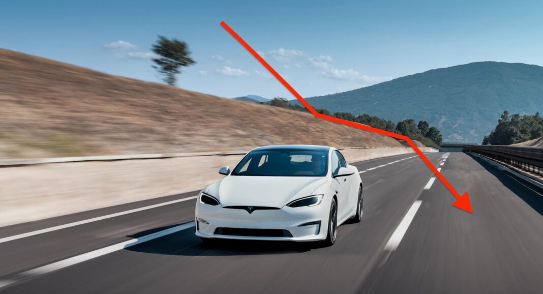 White Tesla Model S driving on highway with a red downtrend arrow overlay symbolizes depreciation