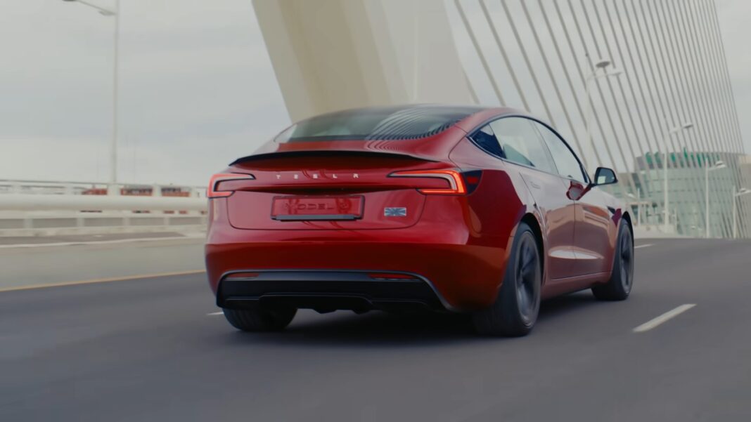 Back of Tesla Model 3 Performance in motion.