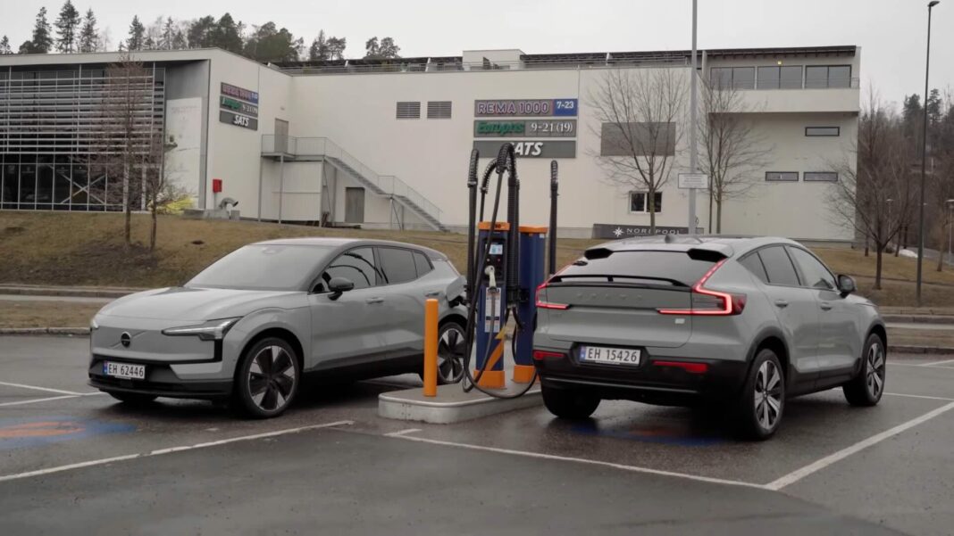 Grey Volvos EX30 and C40 parked and charging next to each other.
